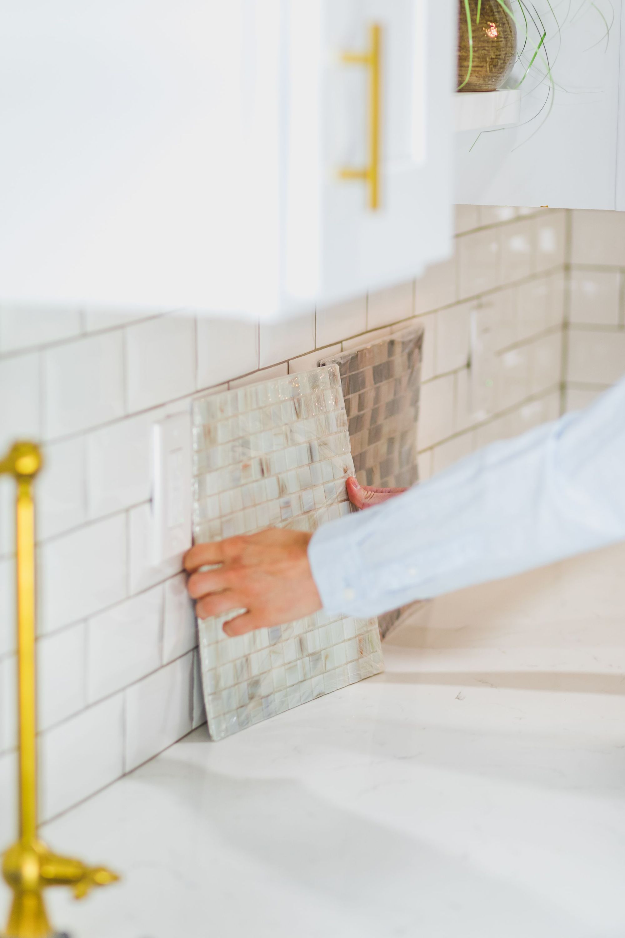 Homeowner choosing tile samples