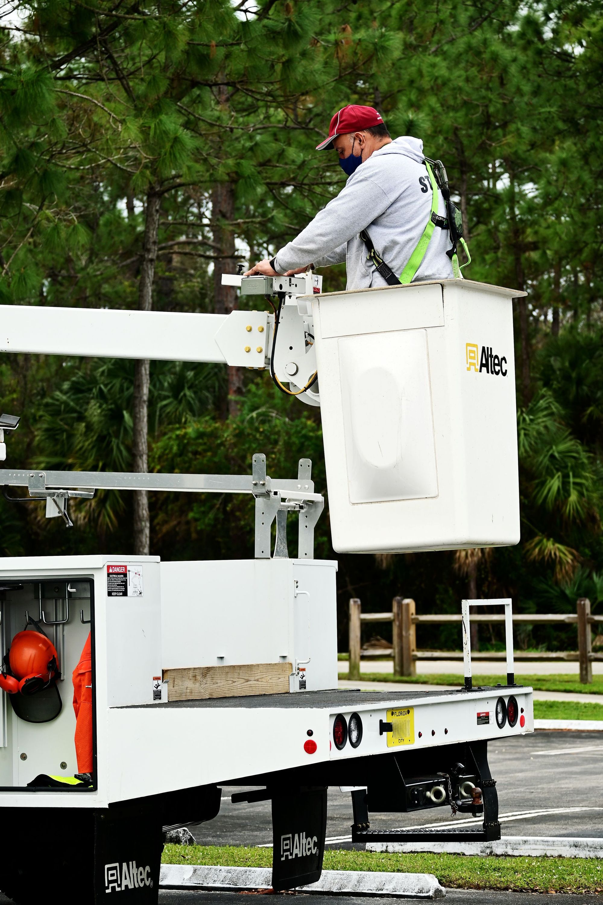 Bucket truck tree work for a Charlotte property manager