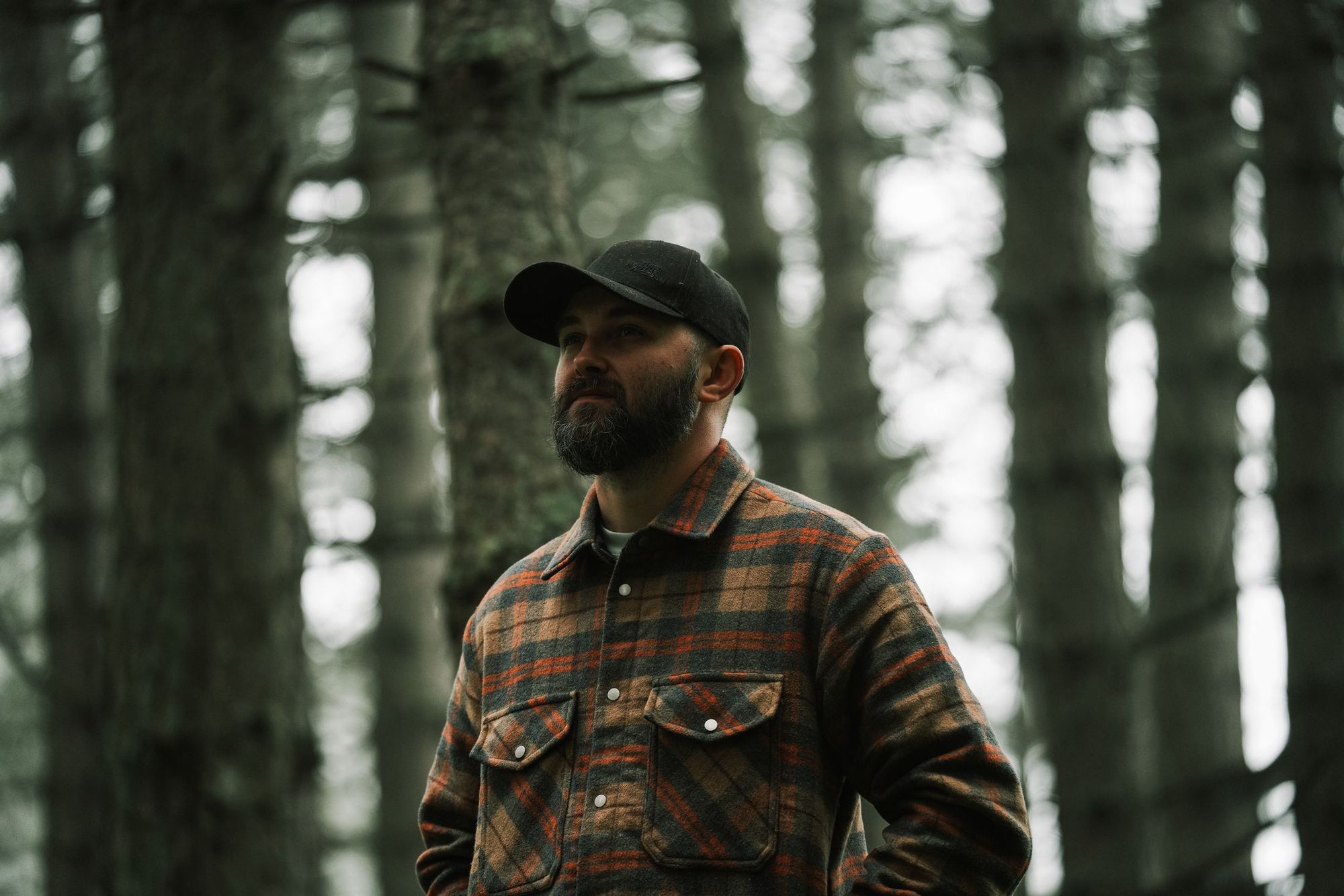 Wes, owner of Highline Tree Co., in the woods near Charlotte