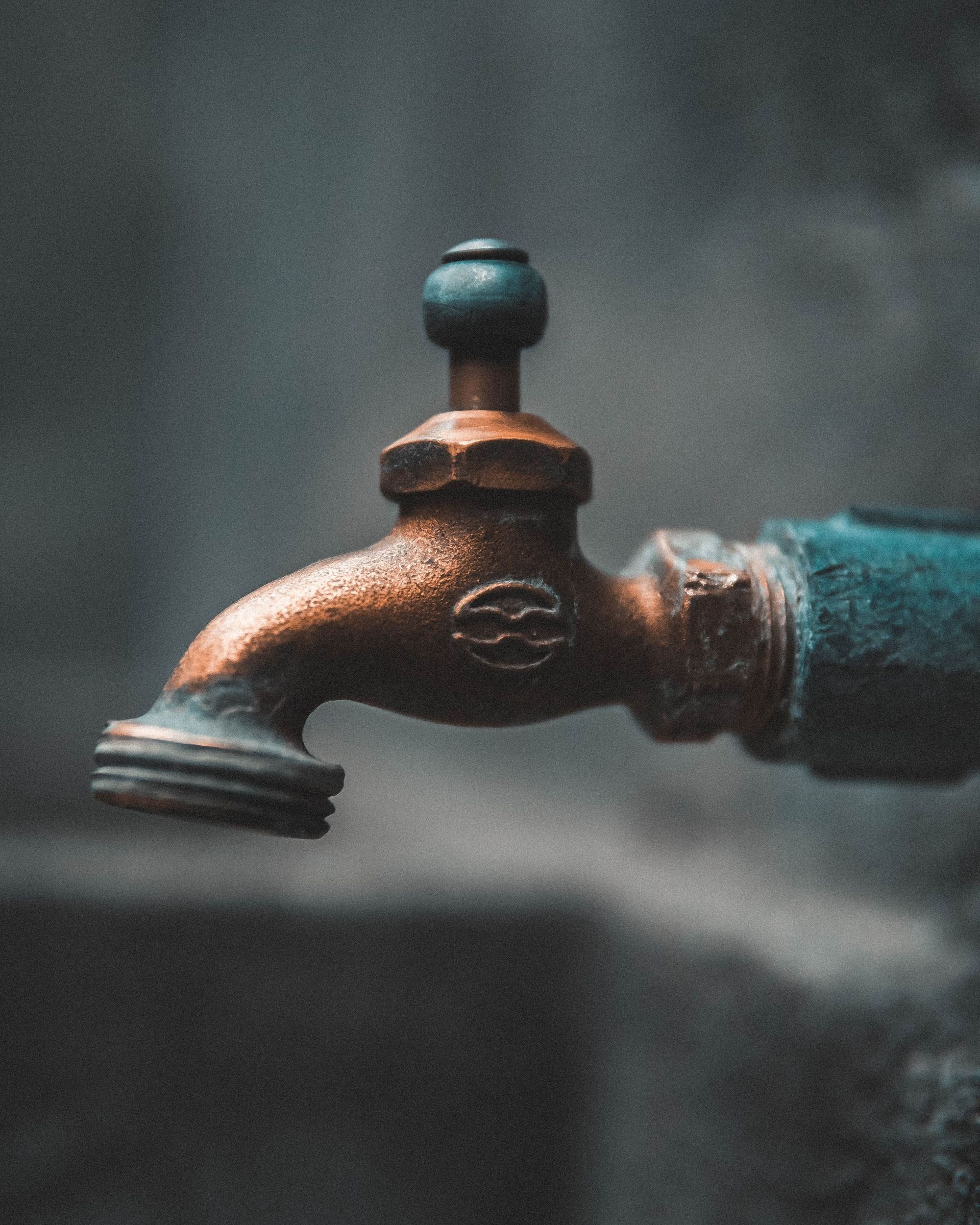 Water dripping from a joint on an outdoor pipe