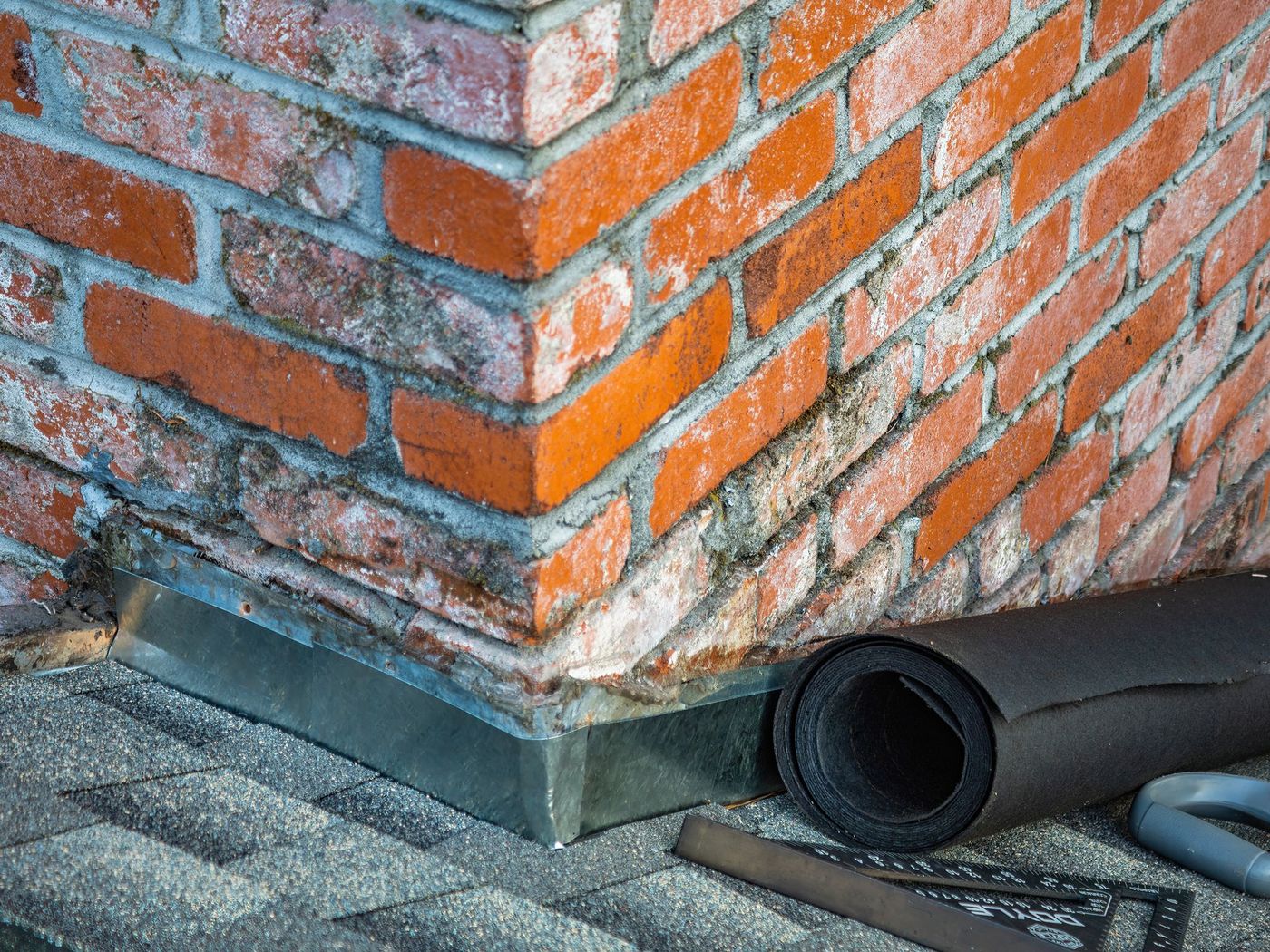 Chimney: counter flashing and cricket